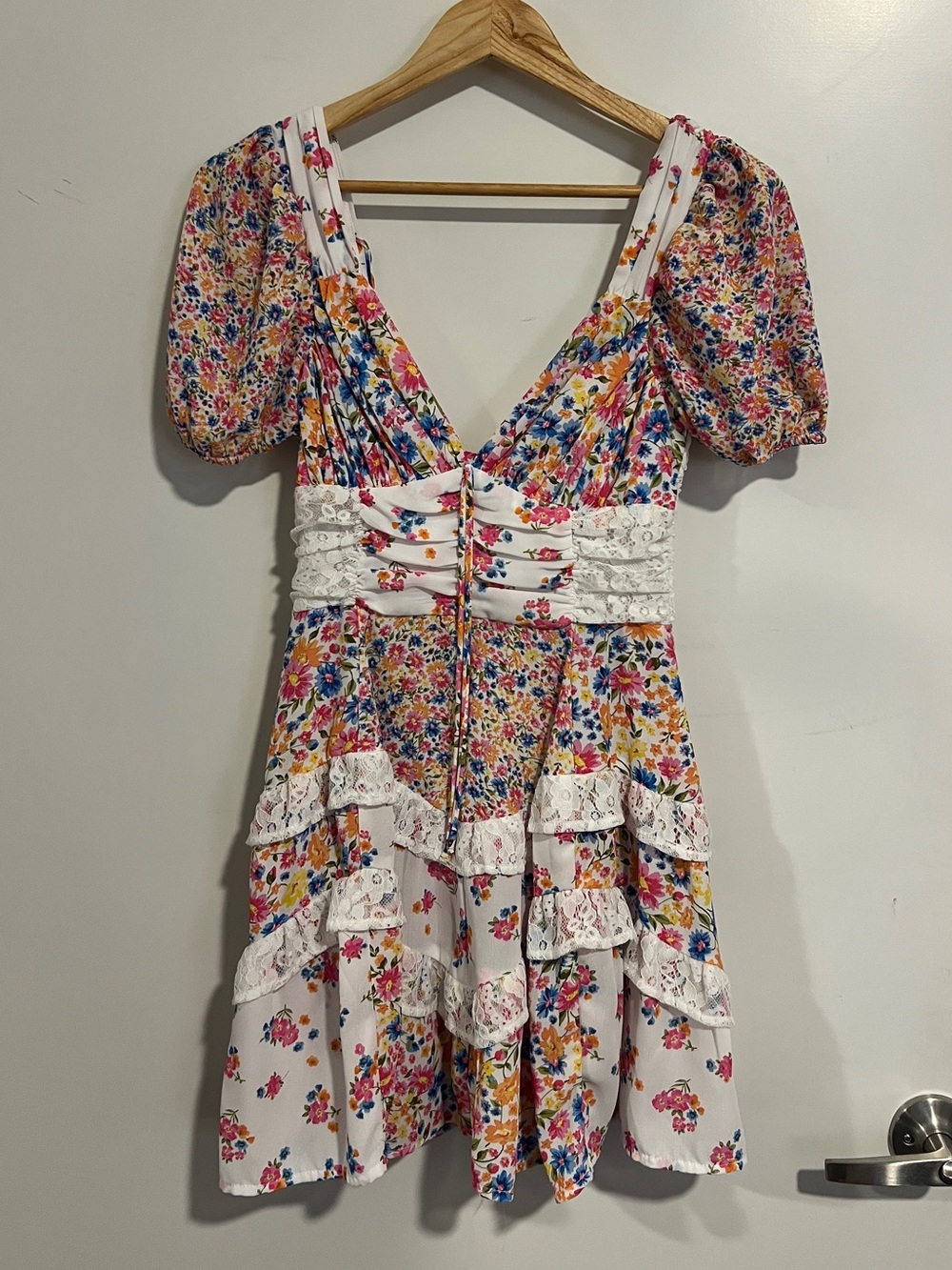 Altar'd State Floral Mini Dress with Lace Accents and a Deep V Neck